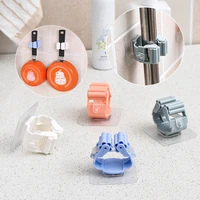 mop and broom holder high quality 1pc folding rack mop organizer hanger hot sale abs seamless kitchen tool storage rack on walls