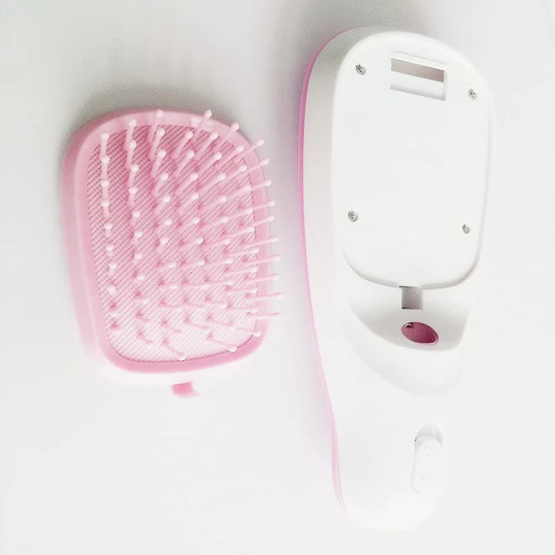 

Negative ion massage comb hair care vibration USB charging portable straight hair comb Shun hair comb electrostatic hair comb