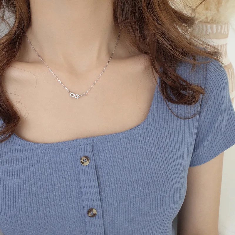 Женская цепочка серебряного цвета с кубическим цирконием и бантом | Украшения