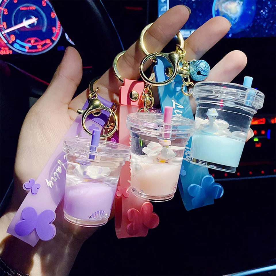 

Cute Creative Milk Tea Bottle Keychain Dreamy Floating Swan Unicorn Moving Liquid Quicksand Keyring for Women Car Keys Bag Decor