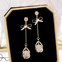 ruiyis925 silver needle korean bow cats eye earrings simple personality trendy earrings long temperament simple earringse0492