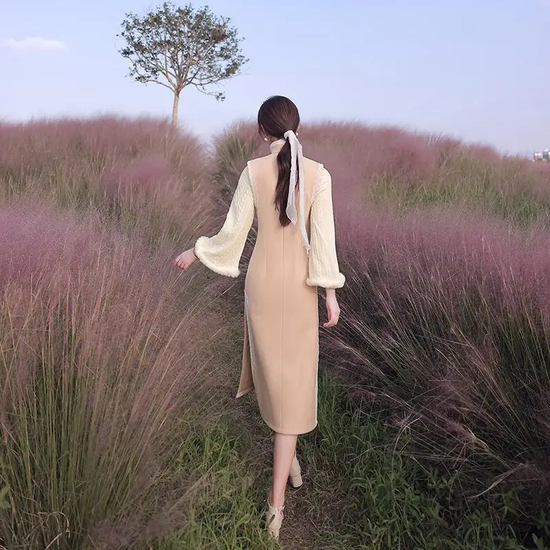 

Improved cheongsam 2021 new autumn and winter long sleeve young winter thickened inverted large sleeve high-end cheongsam dress.