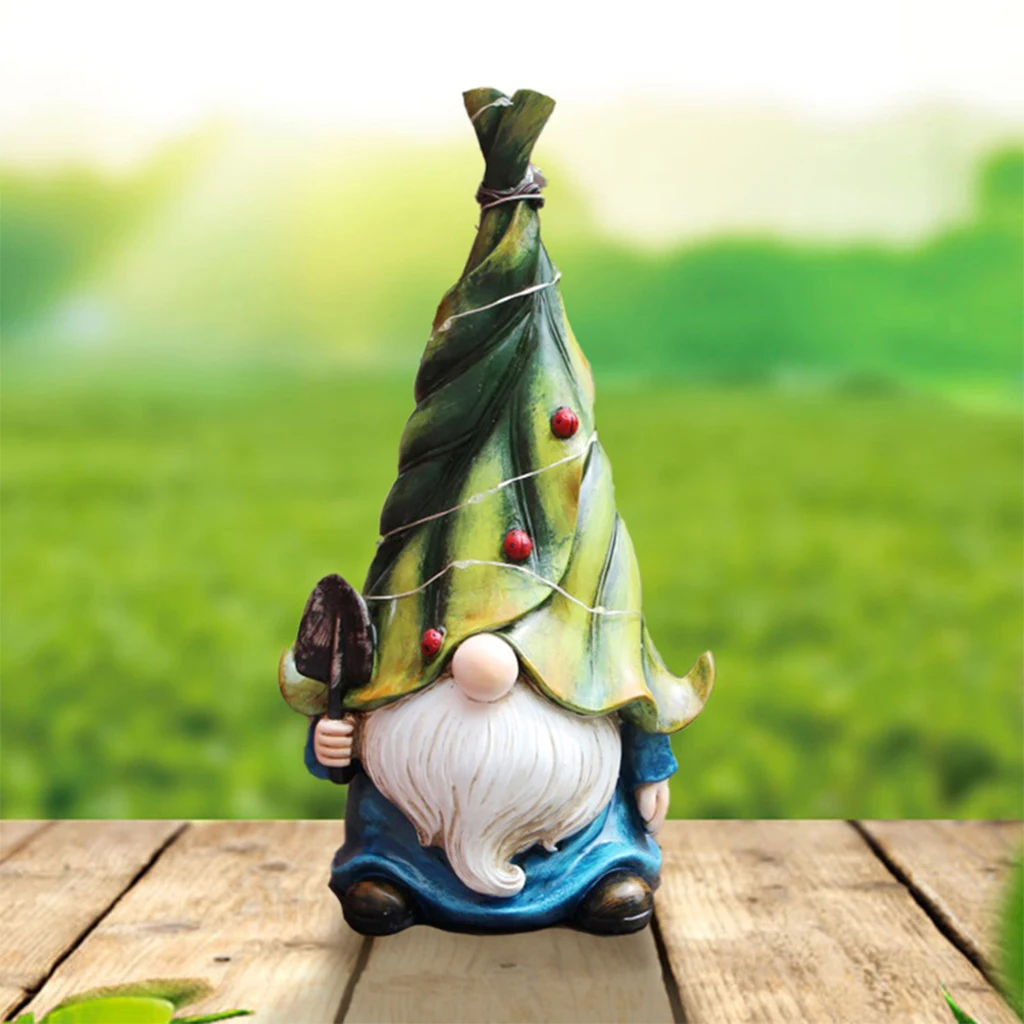 

Solar Glowing Green Leaf Hat Gnome Statue Garden Ornament Lighted Sculpture Cute Cartoon Decoration Gardening Outdoor