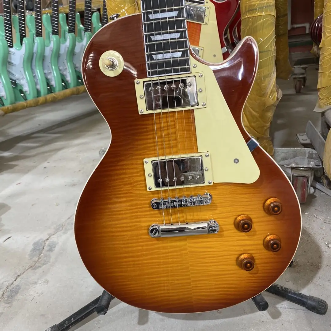 

Стандартная электрическая гитара, цвет табака Sunburst, корпус из красного дерева, фингерборд из красного дерева, серебристая фурнитура, высокое качество, бесплатная доставка