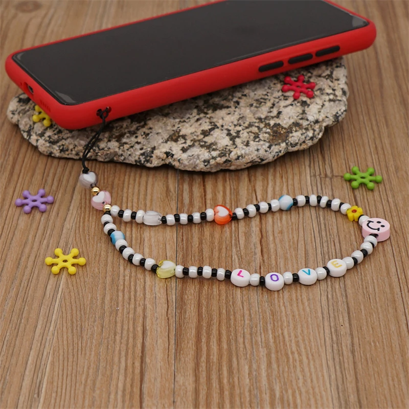 

Bohemian Smiley Eyes Mobile Phone Band Trend Black And White Rice Beads LOVE Letters Ladies Anti-Lost Beaded Mobile Phone Chain