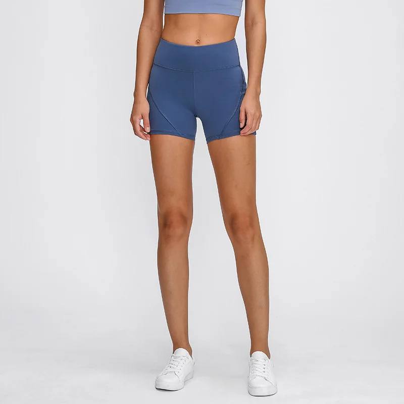 

New splicing Yoga shorts in spring and summer 2022 women's peach hip lifting training fast drying elastic tight sports pants