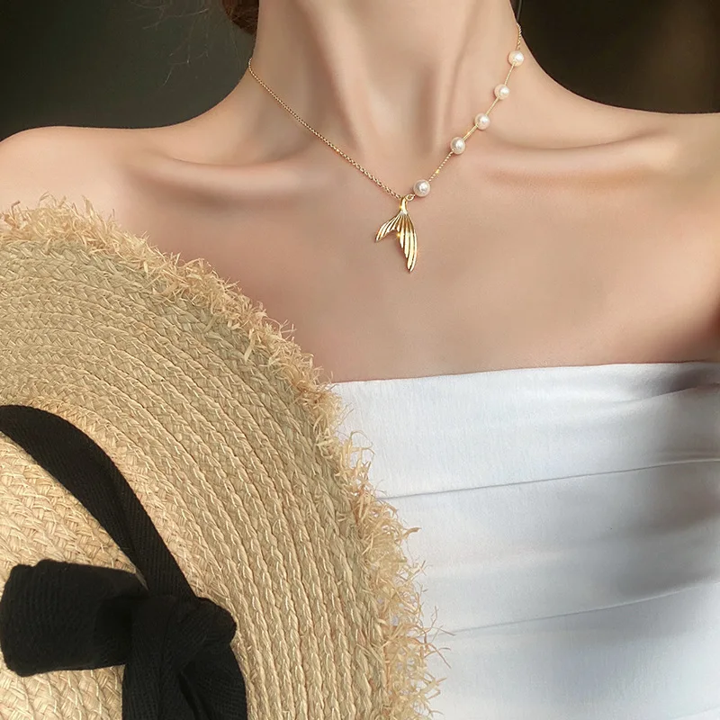 

Minimal temperament pearl necklace fishtail pendant collarbone chain female niche design sense ins cold wind net red neck chain