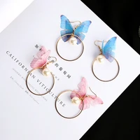 vintage asymmetric butterfly imitation pearl earring fashion round flower earring with long wings beautifully gifted jewelry