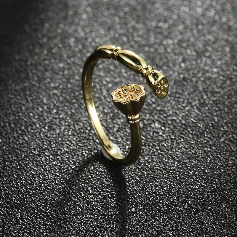 Кольцо женское открытое с лотосом золотистое гальваническим покрытием |