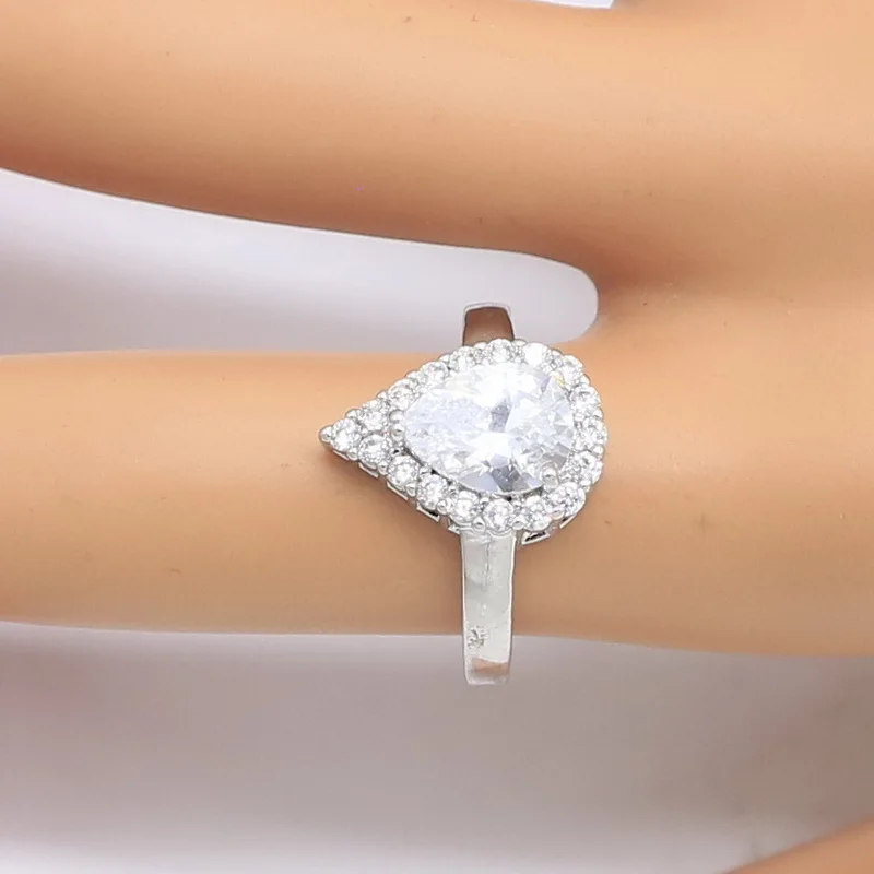 Комплект из кольца и сережек с цирконом серебристого цвета | Украшения