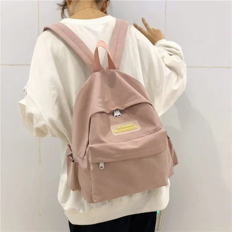 

Versatile little fresh and sweet girl canvas schoolbag school style literary style simple pure color backpack