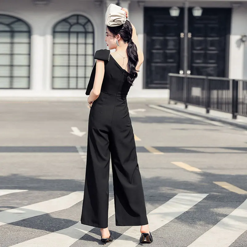 

Summer new Thai niche design feeling jumpsuits diamond bow inclined shoulder collect waist thin wide-legged pants female