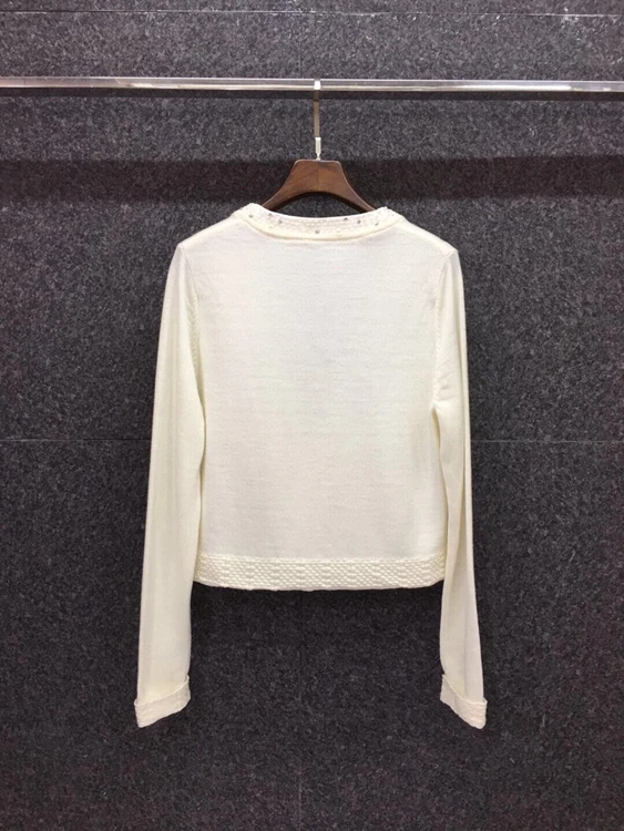 

2020 autumn and winter new women's V-neck heavy industry beaded stand-up collar solid color long-sleeved cardigan sweater 101