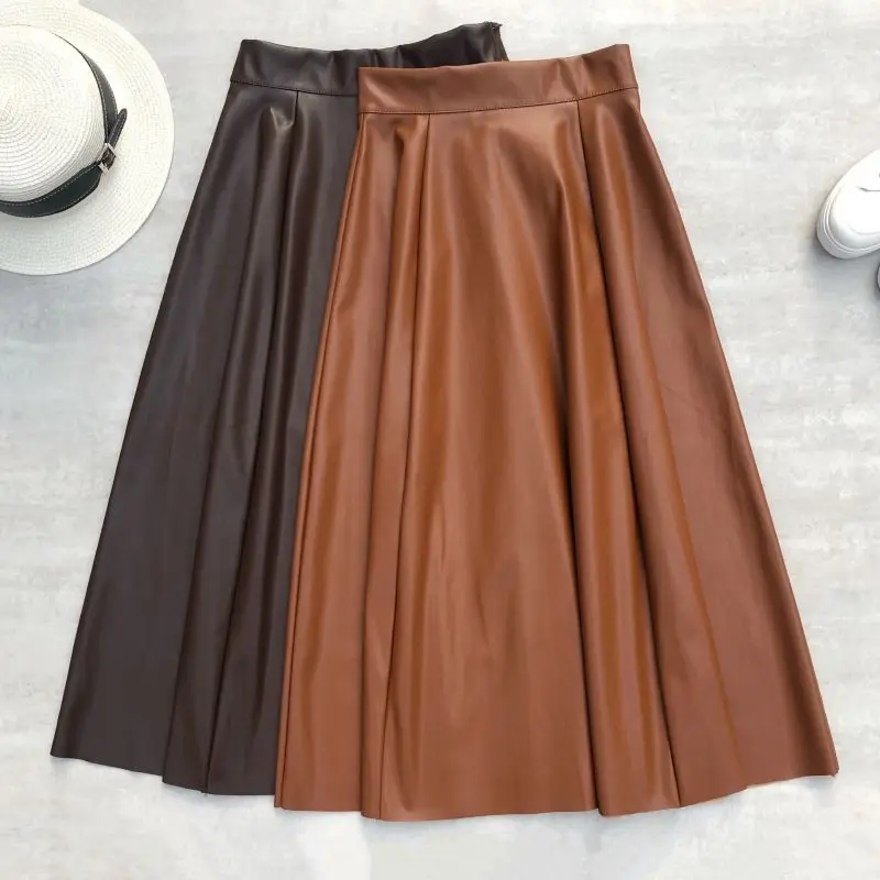 

2021 winter midi long pu leather skirt women solid color high-waist stitching a-line PU leather knee-length brown skirts lady