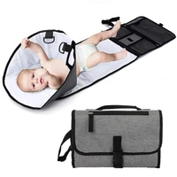 cushion under babys body when changing diaper nappy protable clutch foldable mat pad travel outdoor