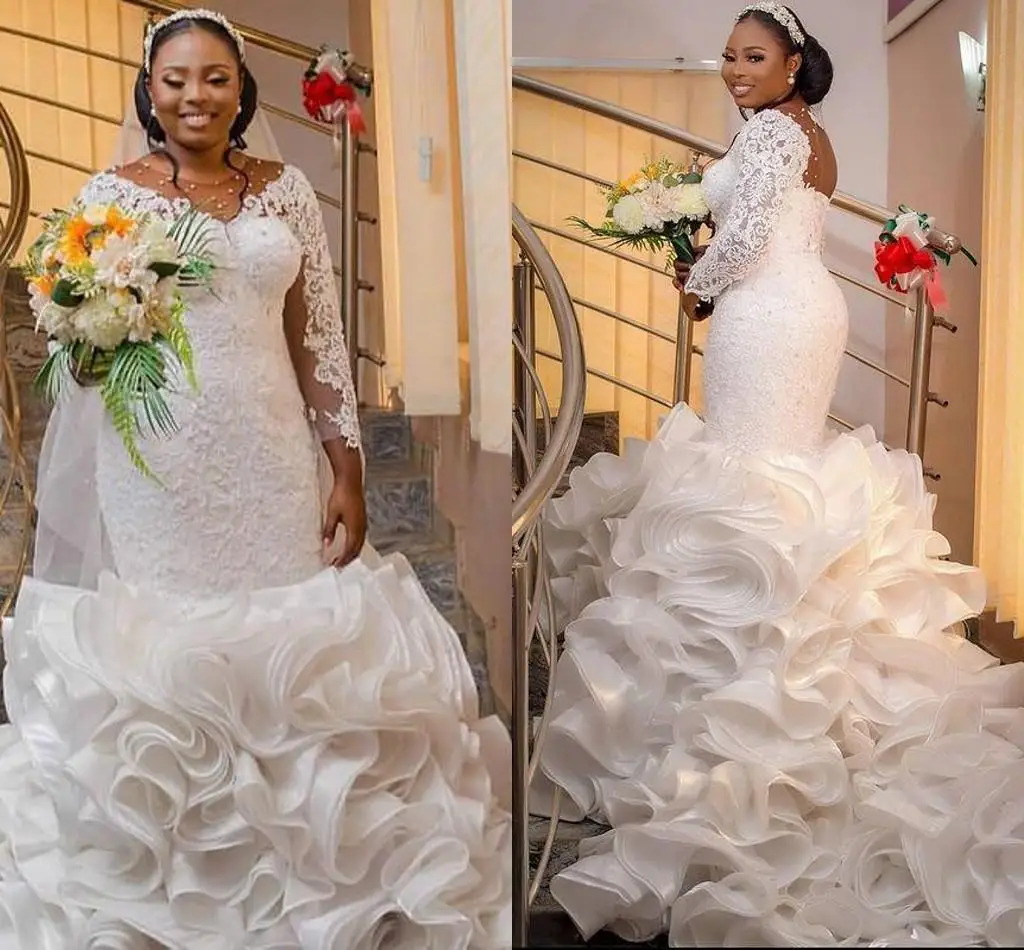 

Nigerian African Mermaid Wedding Dresses Plus Size Ruffles Cathedral Train Lace Sheer Long Sleeve Illsion Back Bridal Dress