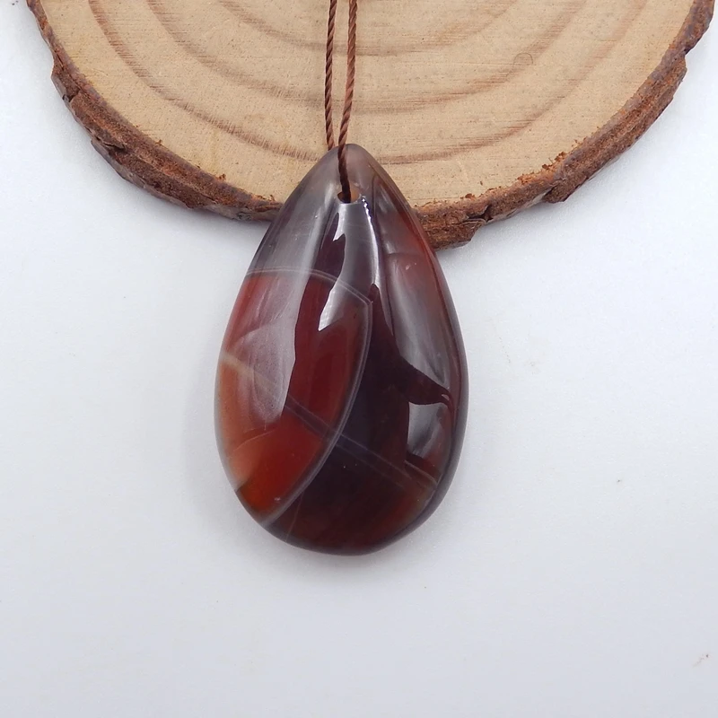 

Натуральный аммонит ископаемые модные полудрагоценные камни, ювелирные аксессуары Подвеска бисер, 35x20x10 мм 8,9г