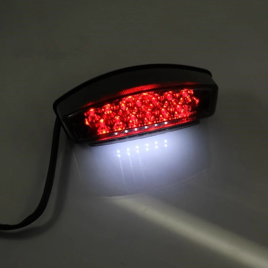 

Universal Smoke Lens Motorcycle License Plate Light 21 LED Scooter Lamp Rear Indicator For Choppers Ducati Triumph Cafe Racer