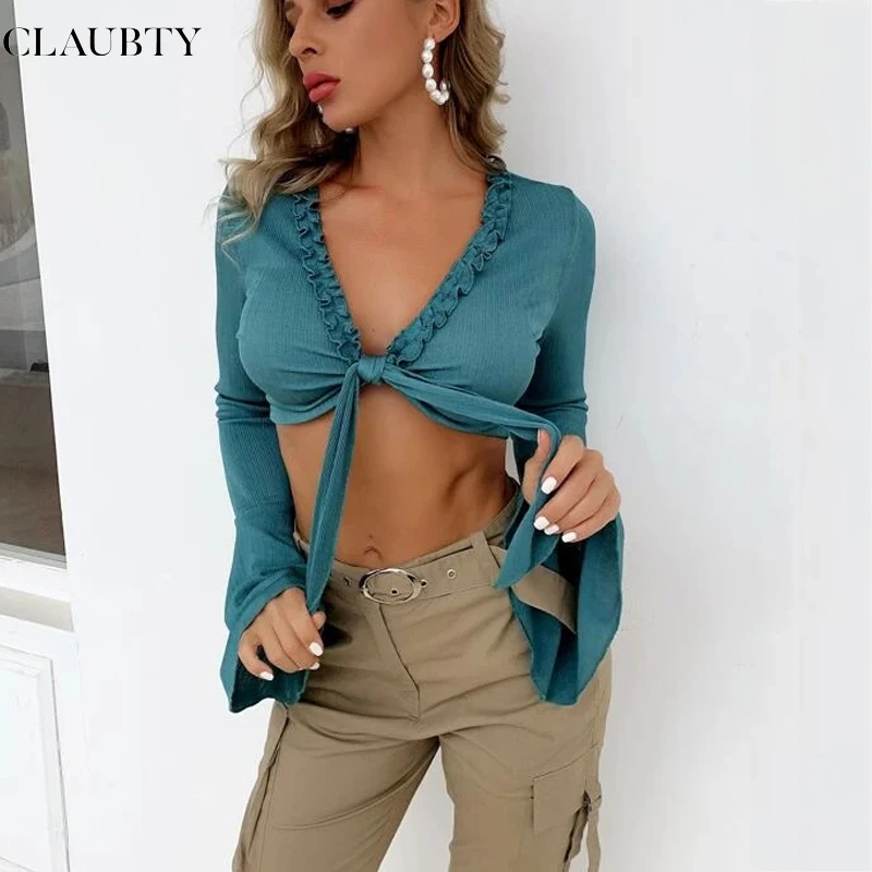 

Женский трикотажный топ с глубоким V-образным вырезом и оборками