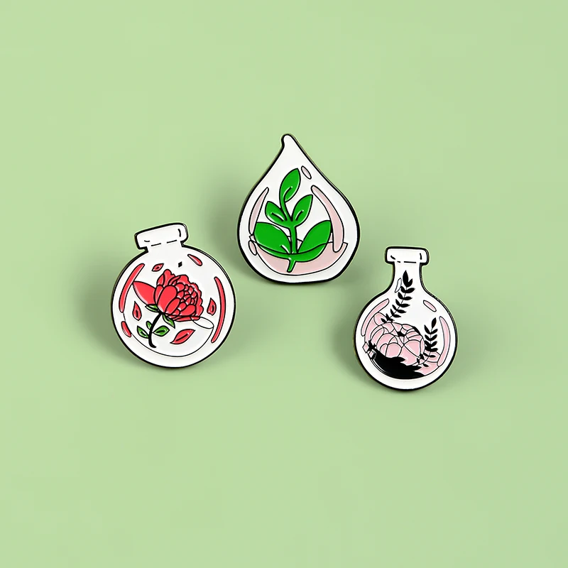 Эмалированные булавки в форме бутылки с растениями красные и розовые значки