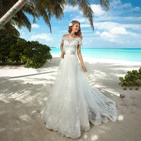 elegant off the shoulder half sleeves crystals belt a line boat neckline applique tulle bride gowns