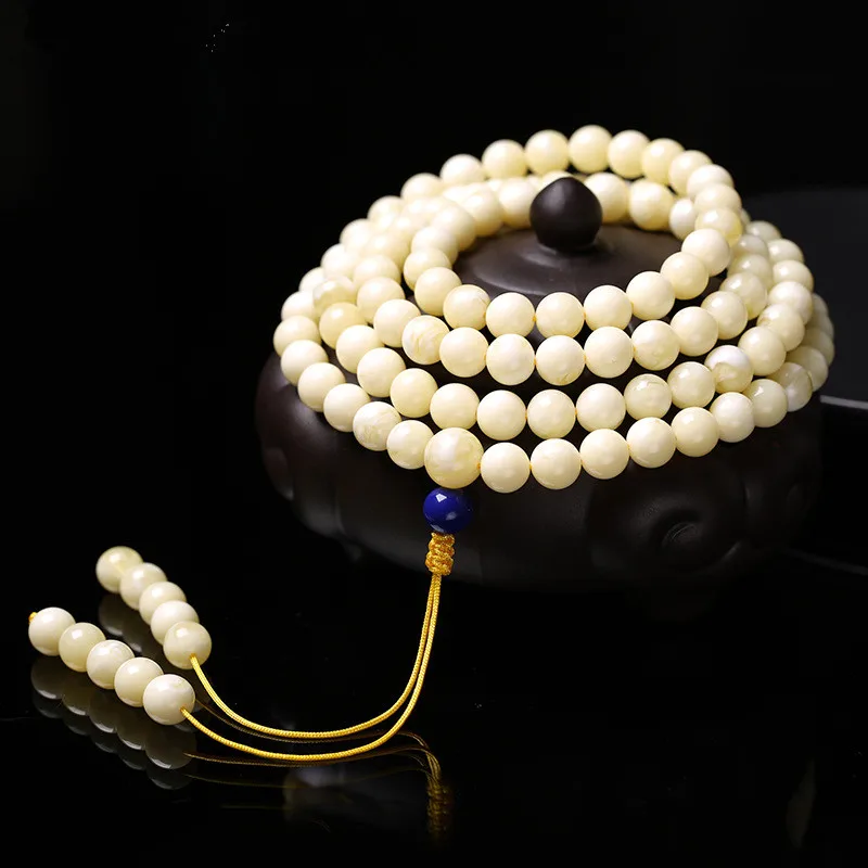 

Amber white nectar 108 beads Buddha beeswax bracelet bracelet men and women 8mm white honey white wax lovers