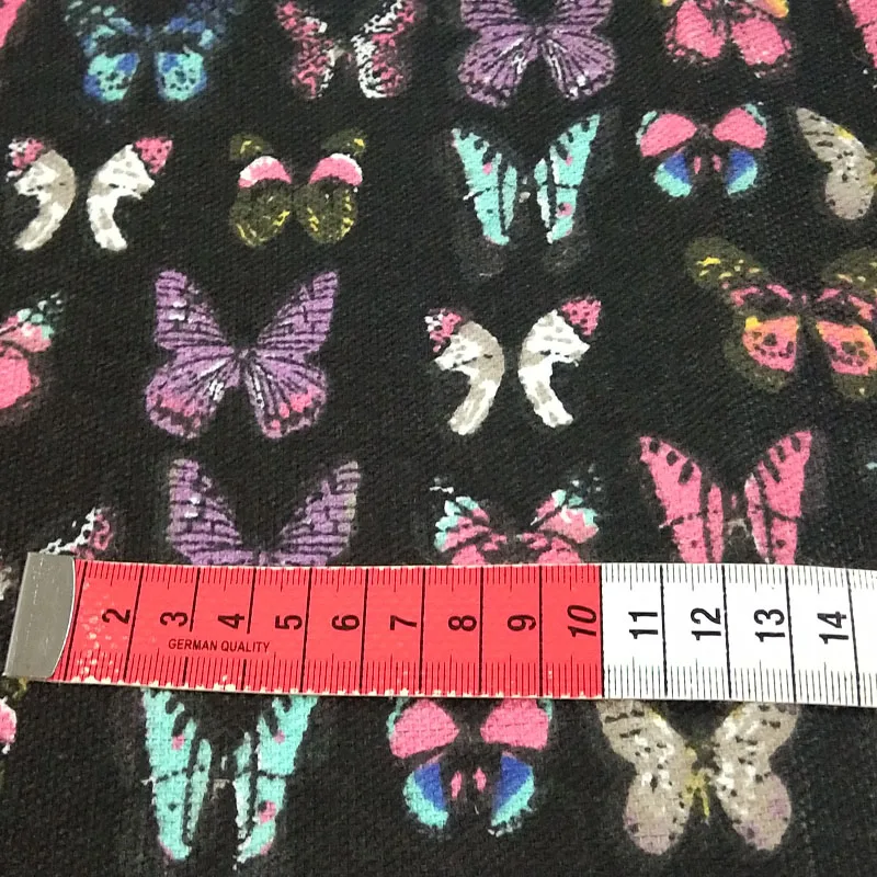 Довольно толстый черный красочными бабочками и бантиками с напечатаным холстом