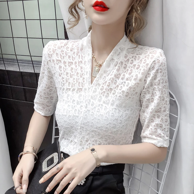 

Real shot summer Korean V-neck lace-up niche sweet bubble sleeve shirt women's French short-sleeved shirt