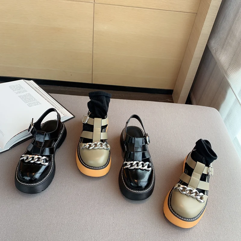 

European and American thick-soled women's sandals and slippers retro British style sponge cake hollow word buckle Roman sandals