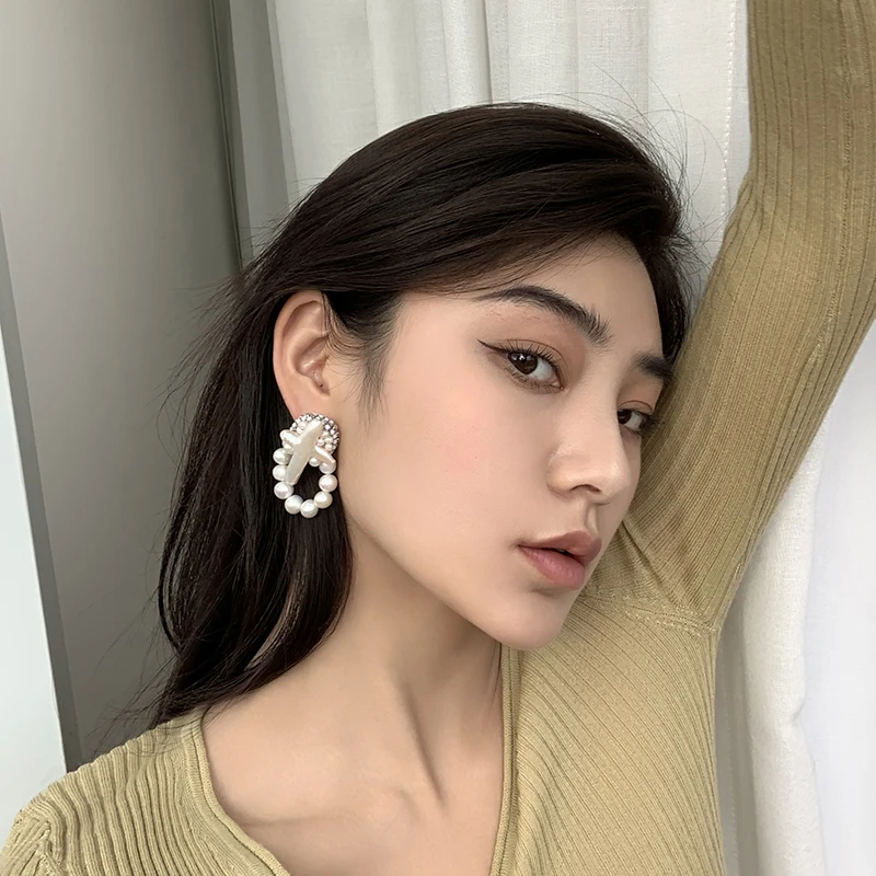 

Handmade limit romantic fresh water pearl temperament earrings fashion
