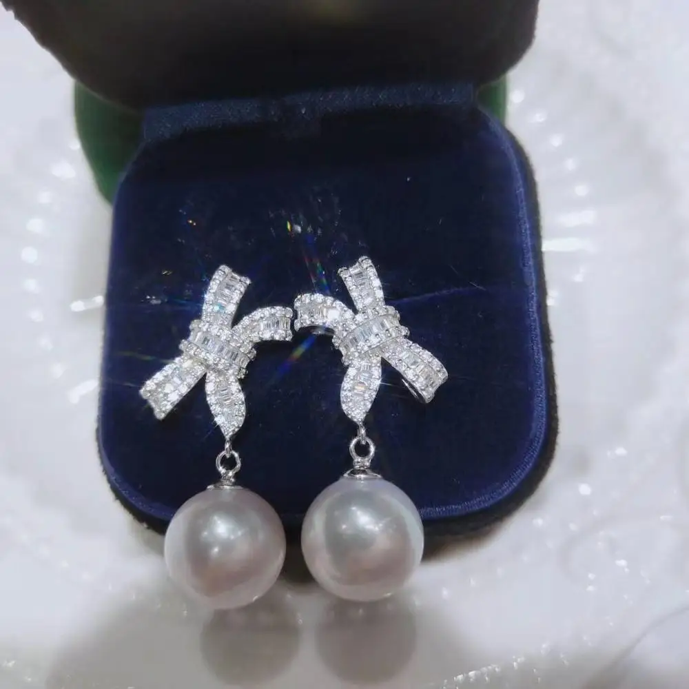 

Luxury style sterling bright and light S925 sterling silver brand bow earrings freshwater big white pearl