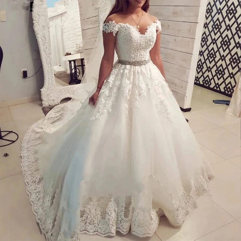 

Sweetheart Off-Shoulder Tulle Ball Gown Wedding Dresses Robe De Mariee Court Train Appliques Crystals Sash Formal Bride Dresses