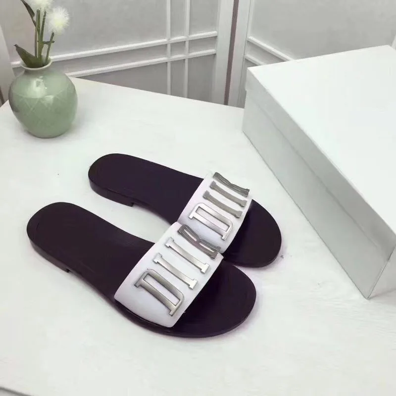 

Summer new style flat-bottomed slippers women summer wear 2021 European and American metal letters female sandals 34-42