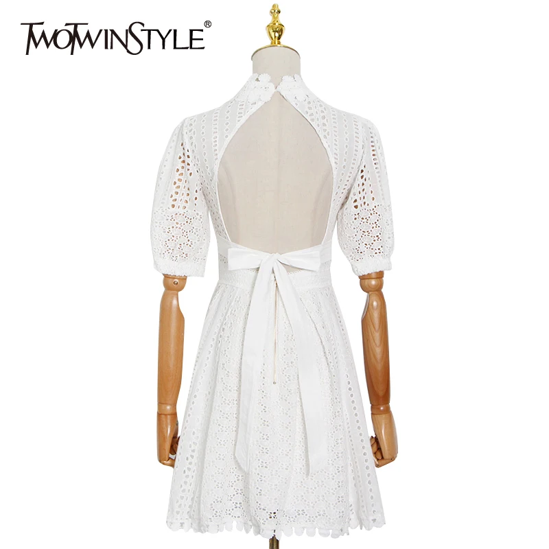 

TWOTWINSTYLE Elegant White Hollow Out Dress For Women Stand Collar Short Sleeve High Waist Lace Up Backless Mini Dresses Females