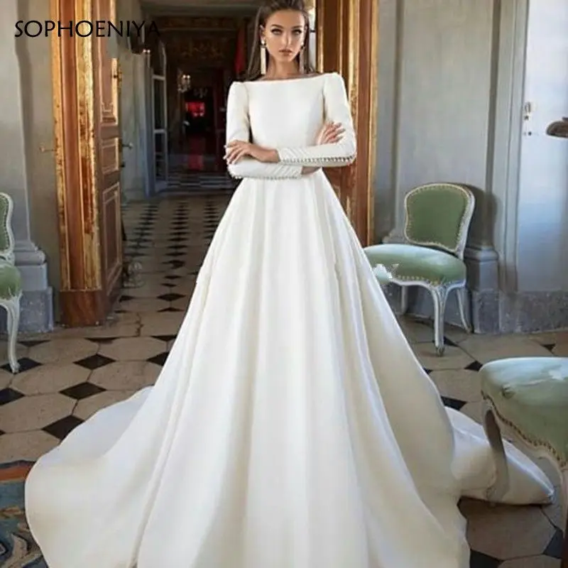 

Saudi Arabic Dubai Luxury Princess Wedding Dresses Long Sleeve Backless Satin Button Bride Dress Vestido de Noiva Bridal Gowns