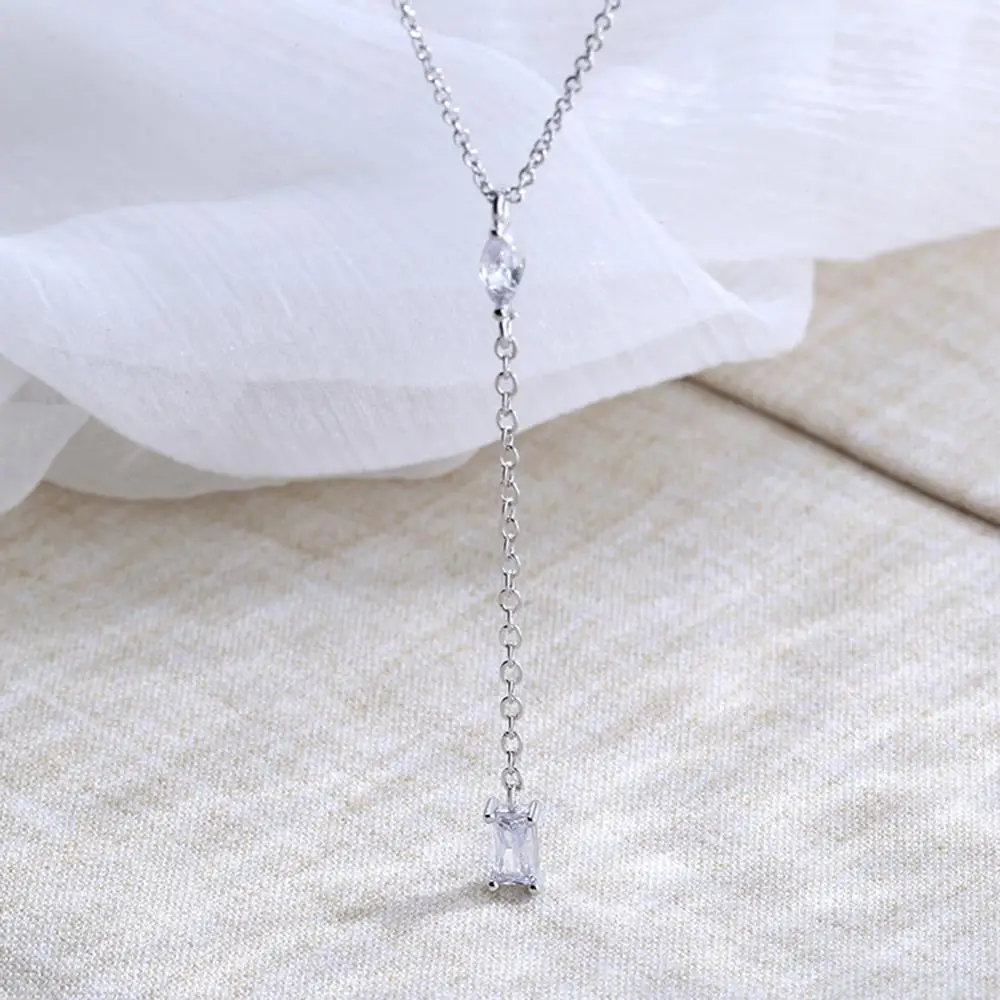 Элегантное модное ожерелье на длинной цепочке с жемчугом и бантом. Простая мерцание циркона.