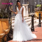 Пляжное свадебное платье в стиле бохо с кружевной аппликацией и V-образным вырезом