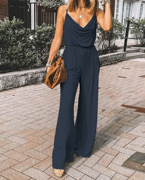 Женский комбинезон с открытой спиной черный однотонный V образным вырезом и