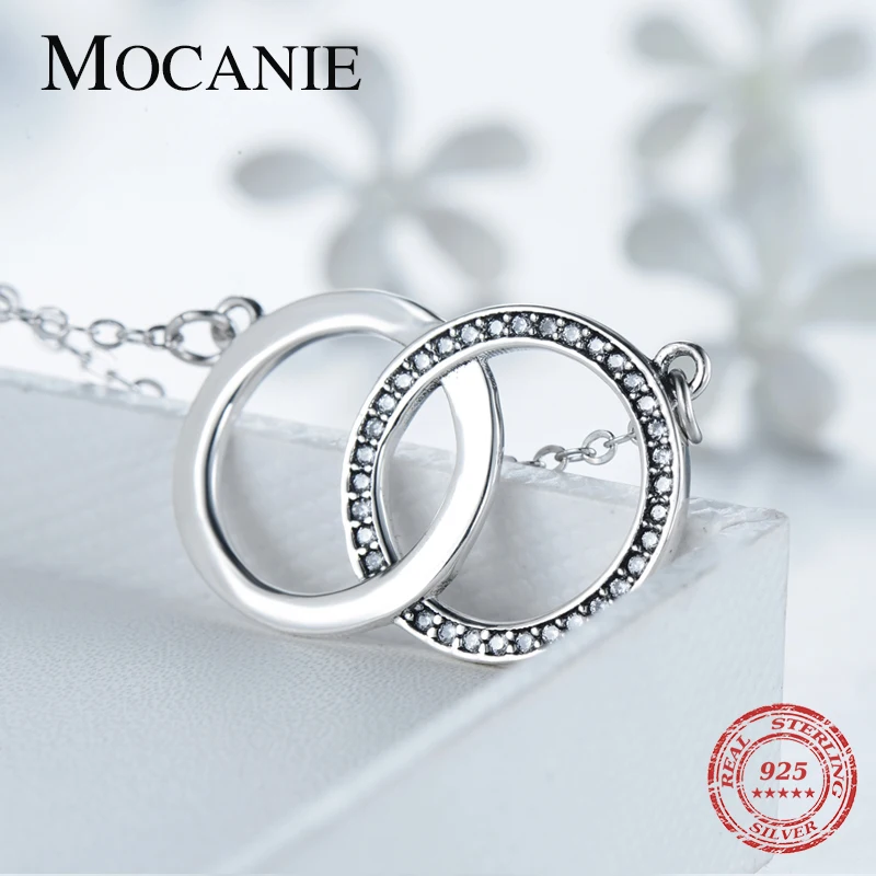 

Mocanie Minimalist Round Circle Interlock Pendant Necklace for Women 925 Sterling Silver Zirconia Geometric Pendant Jewelry Gift