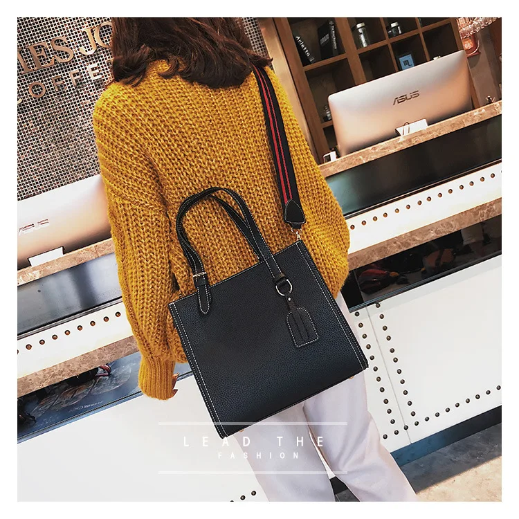 

2019 New stereoscopic large square bag pendant striped wide shoulder belt single shoulder oblique span women's bag