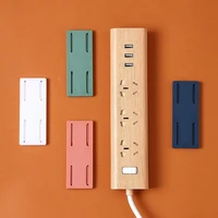 1pcs wall mounted sticker punch free plug fixer home self adhesive socket fixer cable wire seamless power strip holder organizer