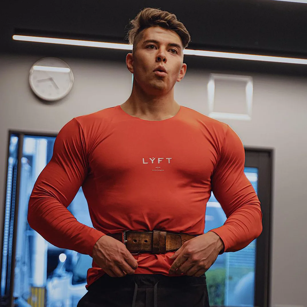 

Muscle fitness men spring and autumn sports pullover bottom shirt milk silk running long sleeves a hair replacement