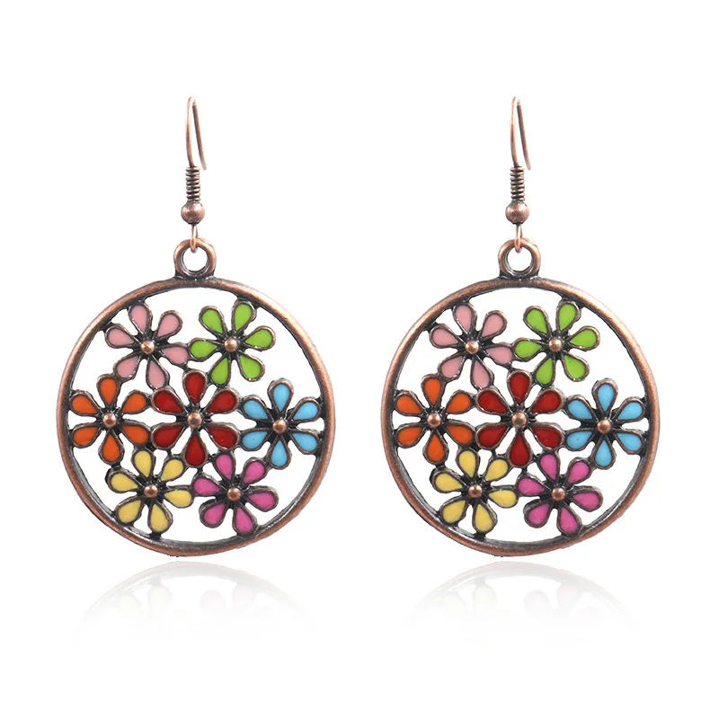 

European And American Fashion Round Hollow Alloy Retro Earrings Creative Flower Earrings Bohemian Ladies Pop Earrings 2021