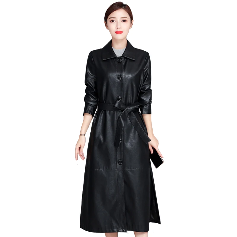 Длинная женская кожаная куртка с поясом осенне зимняя из искусственной кожи