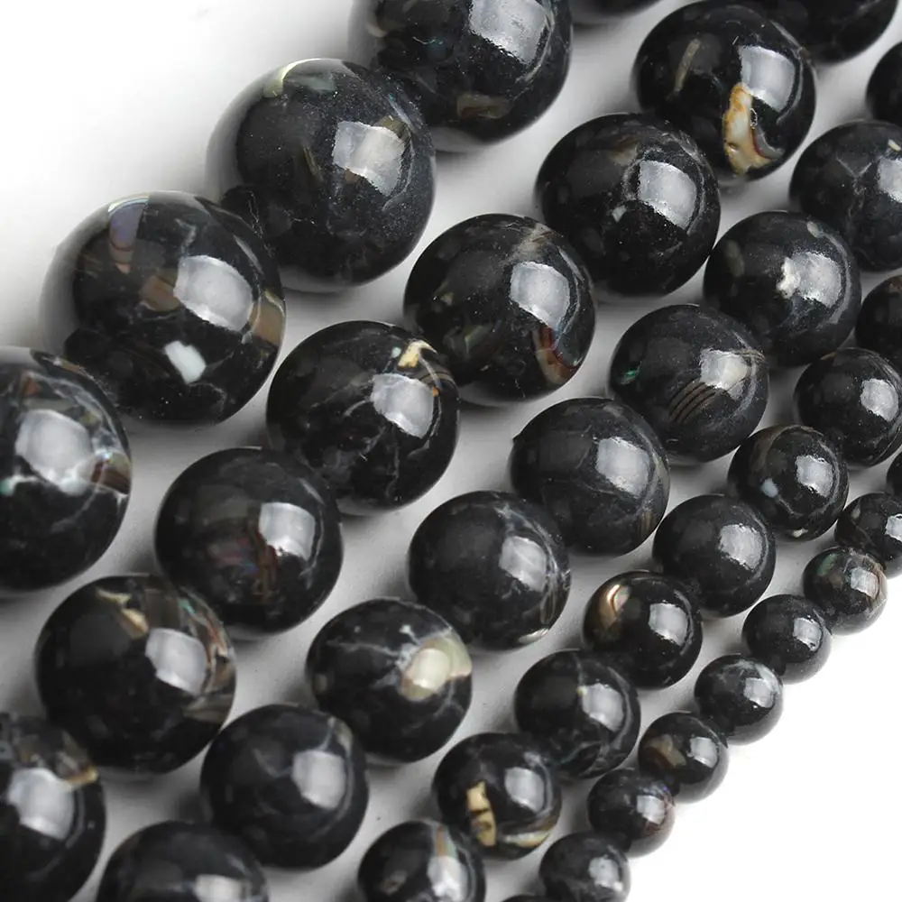 Круглые бусины из натурального черного говлита незакрепленные для изготовления