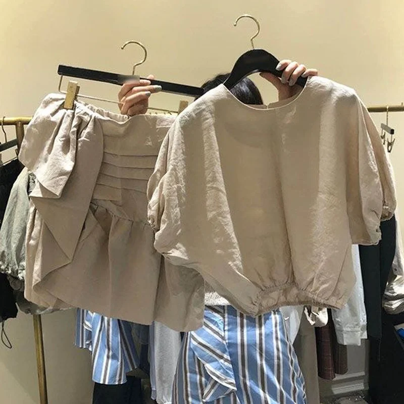 

Summer New 2 Piece Sets Womens O-neck Casual Loose Short Sleeve Shirts Women Blouse + 2021 Chic Folds Lace Up Mini Skirts