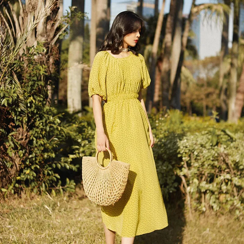 

Open back holiday dress with long skirt and short sleeves