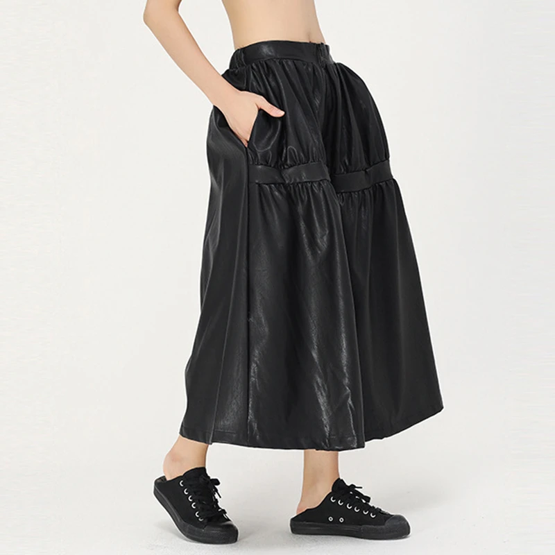

CHICEVER Korean PU Leather Ruched Skirt Women Midi Waist Pocket Oversize Asymmetric Maxi Skirts Female Spring Clothes 2020 New