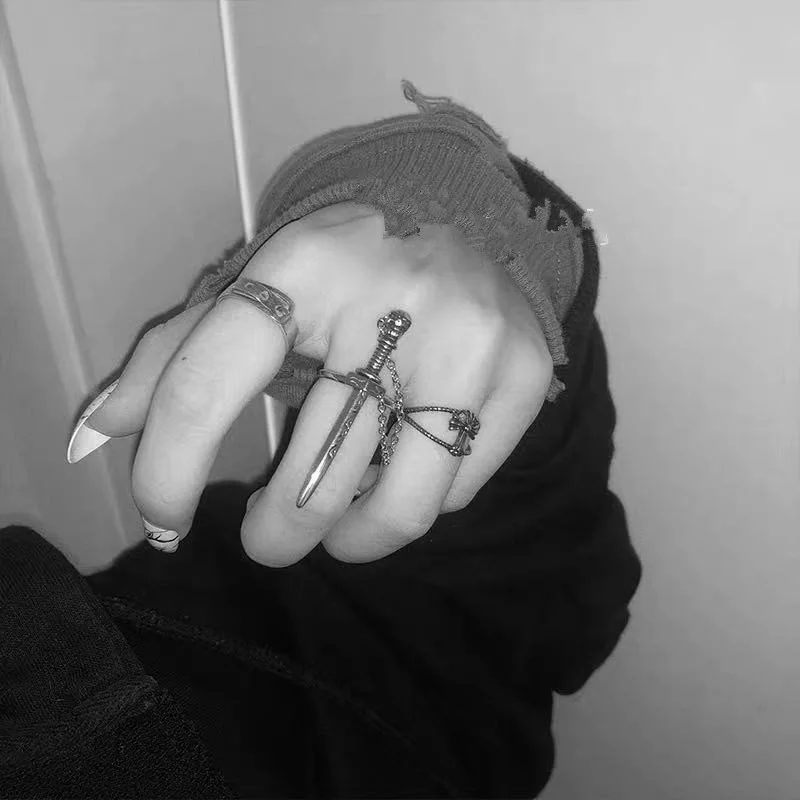 

The new punk style hip-hop sword one-piece ring cool chain pendant insert type personality trend ring jewelry wholesale