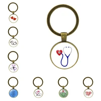 new fashion creative nurse medical syringe stethoscope image keychain glass cabochon and glass dome key ring pendant gift